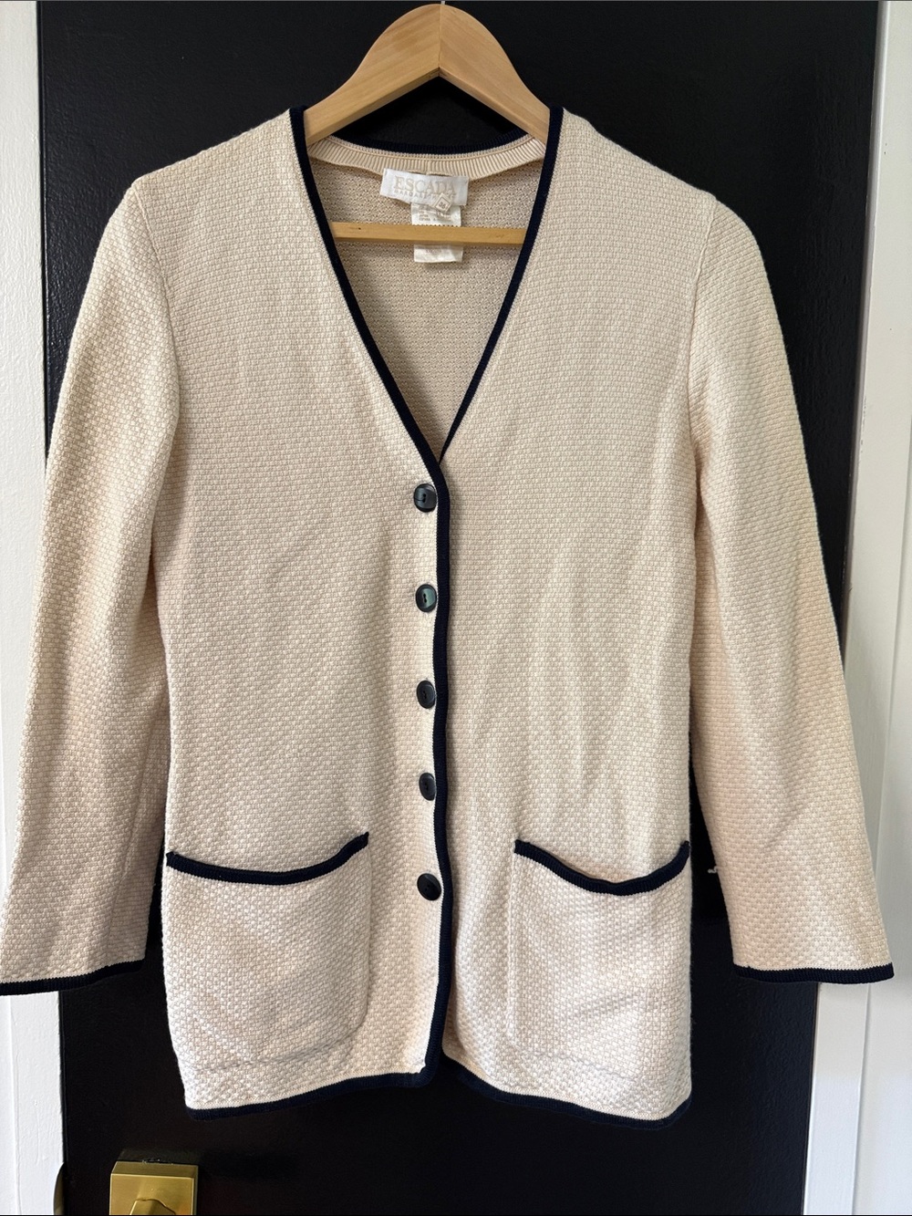 Escada cardigan cream-colored textured knit with contrasting blue trim.